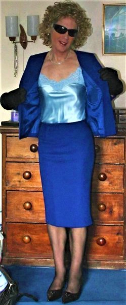 Wearing an expensive Yves St Laurent Skirt Suit during my South London Teaching days.