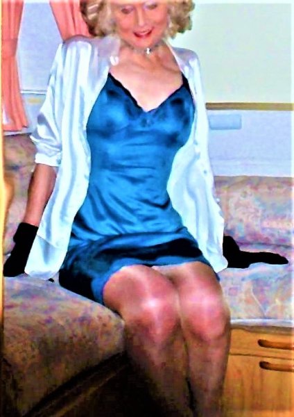 Undressed to my lavishly expensive Royal Blue satin and lace full length slip.