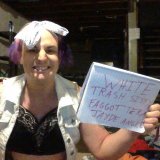 sissypansy weakling smiling wide with sign for Miss K
