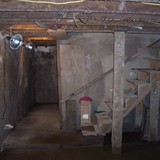 root cellar at bottom of stairs