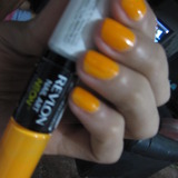 freshly painted nails in high voltage neon orange