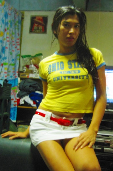 fresh from the bath..in yellow baby tee and denim mini-skirt