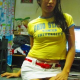 fresh from the bath..in yellow baby tee and denim mini-skirt